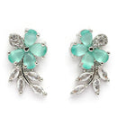 Rhodium Plated Silver Toned Floral Shaped Sea Green & White American Diamond Studded Stud Earrings