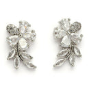 Rhodium Plated Silver Toned Floral Shaped White American Diamond Studded Stud Earrings