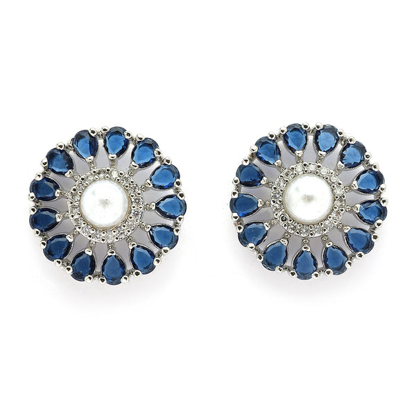 Rhodium Plated Silver Toned Floral Shaped Blue & White American Diamond & Pearl Studded Stud Earrings