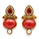 Traditional Gold Plated Oval Shaped Red Stone And Pearl Studded Earrings