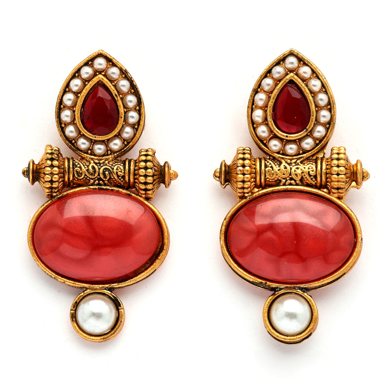 Traditional Gold Plated Oval Shaped Red Stone And Pearl Studded Earrings