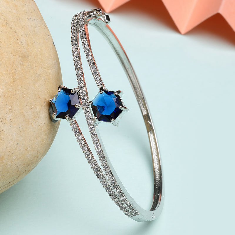 Rhodium Plated Silver Toned Round Shaped  Blue American Diamond Studded  Bracelet