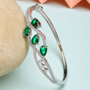 Rhodium Plated Silver Toned Emerald Green American Diamond Studded Bracelet