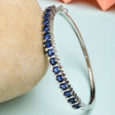 Rhodium Plated Silver Toned Blue American Diamond Studded Bracelet