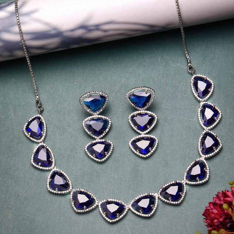 Rhodium Plated Silver Toned Blue Trillion Cut American Diamond Studded  Necklace With Matching Drop Earrings