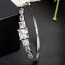 Rhodium Plated Silver Toned Square Shaped White American Diamond Studded Bracelet
