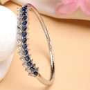 Rhodium Plated Silver Toned Leaf Shaped Royal Blue American Diamond Studded Bracelet