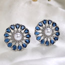 Rhodium Plated Silver Toned Floral Shaped Blue & White American Diamond & Pearl Studded Stud Earrings