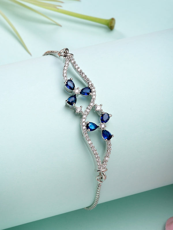 Rhodium Plated with Blue American Diamond Studded Curved & Floral Design Bracelet