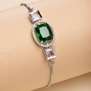 Rhodium Plated Silver Toned Rectangular Emerald Green American Diamond Studded Bracelet
