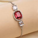 Rhodium Plated Silver Toned Rectangular Ruby Red American Diamond Studded Bracelet