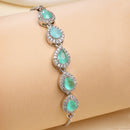 Rhodium Plated Silver Toned Teardrop Sea Green American Diamond Studded Bracelet