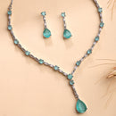 Rhodium Plated Silver Toned Teardrop Shaped Sea Green & White American Diamond Studded Jewellery Set