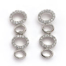 Rhodium Plated Silver Toned Oval Shaped White American Diamond Studded Jewellery Set