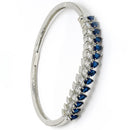 Rhodium Plated Silver Toned Leaf Shaped Royal Blue American Diamond Studded Bracelet