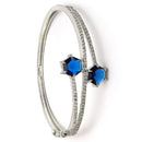 Rhodium Plated Silver Toned Round Shaped  Blue American Diamond Studded  Bracelet