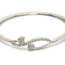 Rhodium Plated Silver Toned Twisted White American Diamond Studded Bracelet