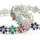 Rhodium Plated Silver Toned Floral Shaped Multicolor American Diamond Studded Bangles Set Of 2