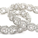 Rhodium Plated Silver Toned Bow Shaped White American Diamond Studded Bangles Set Of 2