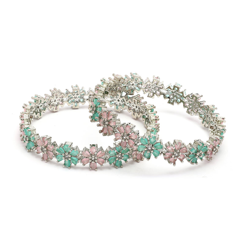 Rhodium Plated Silver Toned Floral Shaped Sea Green & Pink American Diamond Studded Bangles Set Of 2