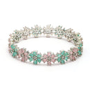 Rhodium Plated Silver Toned Floral Shaped Sea Green & Pink American Diamond Studded Bangles Set Of 2