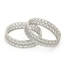Rhodium Plated Silver Toned Oval Shaped American Diamond Studded Bangles Set Of 2