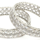 Rhodium Plated Silver Toned Oval Shaped American Diamond Studded Bangles Set Of 2