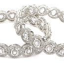 Rhodium Plated Silver Toned Oval Shaped White American Diamond Studded Bangles Set Of 2