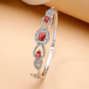 Rhodium Plated Silver Toned Oval & Teardrop Red American Diamond Studded Cuff Bracelet