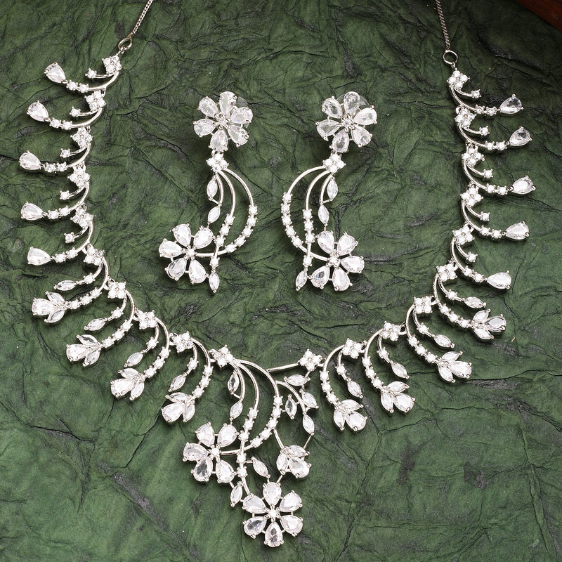 Rhodium Plated Silver Toned White American Diamond Studded Floral Jewellery Set