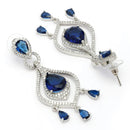 Rhodium Plated Silver Toned Teardrop Shaped Blue & White American Diamond Studded Earrings