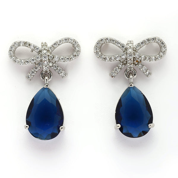 Rhodium Plated Silver Toned Bow Shaped Navy Blue & White American Diamond Studded Drop Earrings