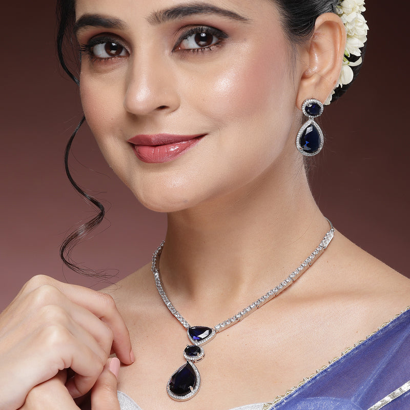 Rhodium Plated Silver toned Teardrop Shaped Blue American Diamond Studded Jewellery Set