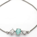 Rhodium Plated Silver Toned Sea Green And White American Diamond Studded Adjustable Bracelet