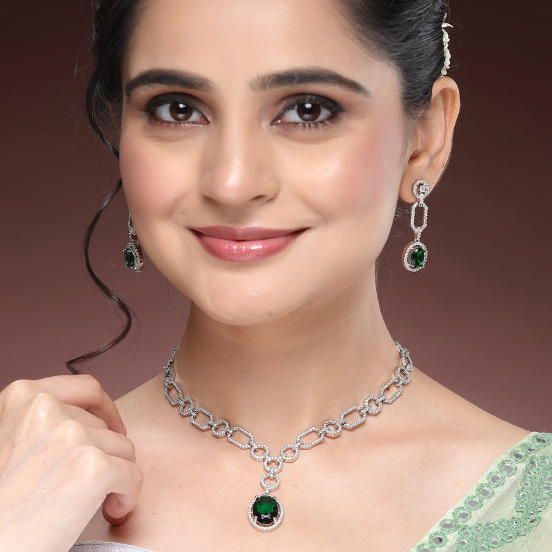 Rhodium Plated Silver Toned Emerald Green American Diamond Studded Jewellery Set