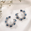 Rhodium Plated Silver Toned Navy Blue & White American Diamond Embellished Earrings