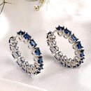 Rhodium Plated Silver Toned Navy Blue American Diamond Embellished Hoop Earrings
