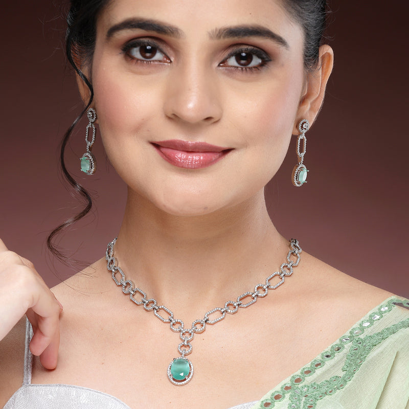 Rhodium Plated Silver Toned Sea Green American Diamond Studded Jewellery Set