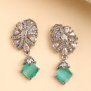 Rhodium Plated Silver Toned Leaf Shaped White And Sea Green American Diamond Studded Drop Earrings