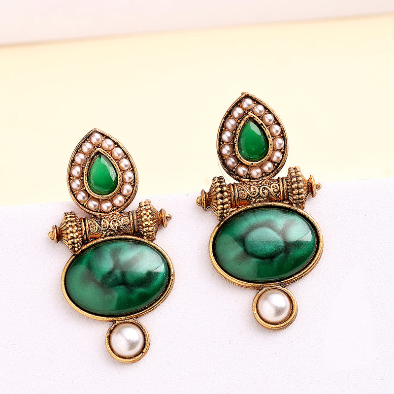 Traditional Gold Plated Oval Shaped Green Stone And Pearl Studded Earrings