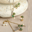 Gold Plated American Diamond And Emerald Green Crystal Necklace Set With Pendant, Earring And Ring