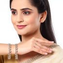 Set Of 4 Gold-Plated White American Diamond studded Dual Toned Paisley and Floral Design Bangles