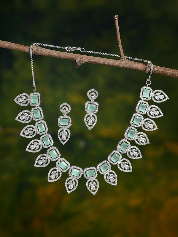 Rhodium Plated Silver Toned Teardrop Floral Design White  & Sea Green Square AD Studded Necklace Set & Matching Earrings