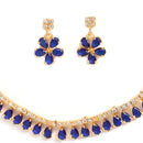 Floral Shaped Gold-Plated Navy Blue American Diamond Studded  Jewellery Set with Earrings