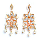 Flower Shaped Gold-Plated Kundan Pearl & Ruby White Beads Studded Necklace Set With Crystal Earring and Maang Tika