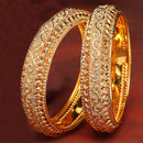 Set Of 4 Gold-Toned Textured Bangles