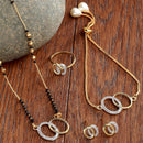 Gold-Plated & White AD-Studded & Beaded Oval Shaped Mangalsutra