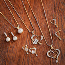 Gold-Plated White Cubic Zirconia Stone Studded Pendant Set With Chain & Earrings Combo