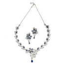 Rhodium-Plated Navy Blue American Diamond Studded Floral & Paisley Shaped Necklace with Earrings Jewellery Set