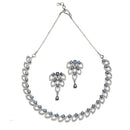 Rhodium-Plated Navy Blue American Diamond Studded Leaf Shaped Necklace with Earrings Jewellery Set